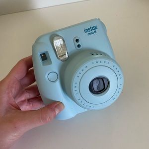 light blue Polaroid camera! 🦋
